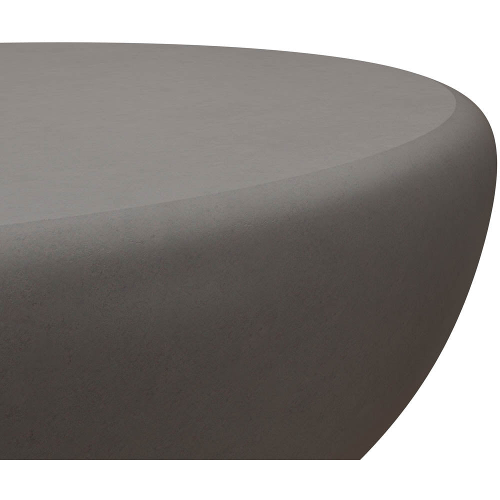 Table basse moderne aspect pierre et métal avec plateau rond pour le salon