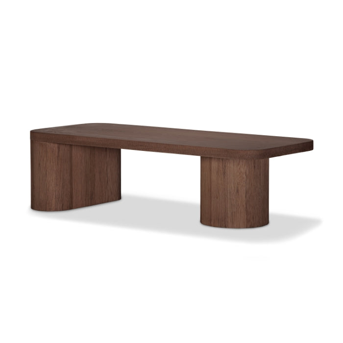 Table basse minimaliste en bois massif avec base monolithique pour salon