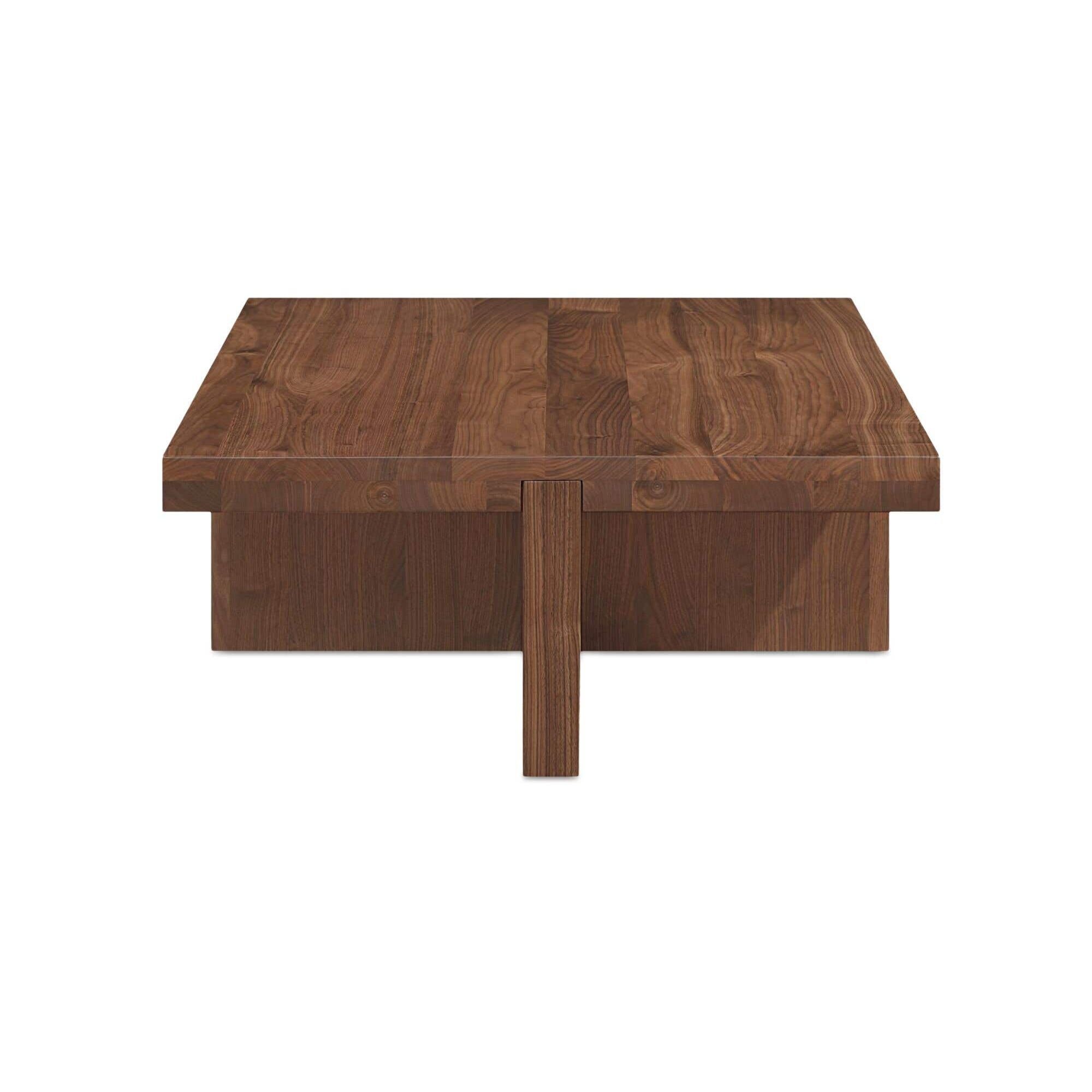 Table basse scandinave en bois massif avec cadre minimaliste pour salon